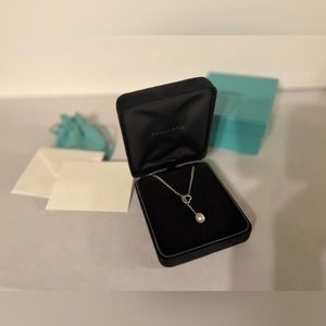 Tiffany & Co. Elsa Peretti, Open Heart Lariat Necklace
in Silver with Pearls